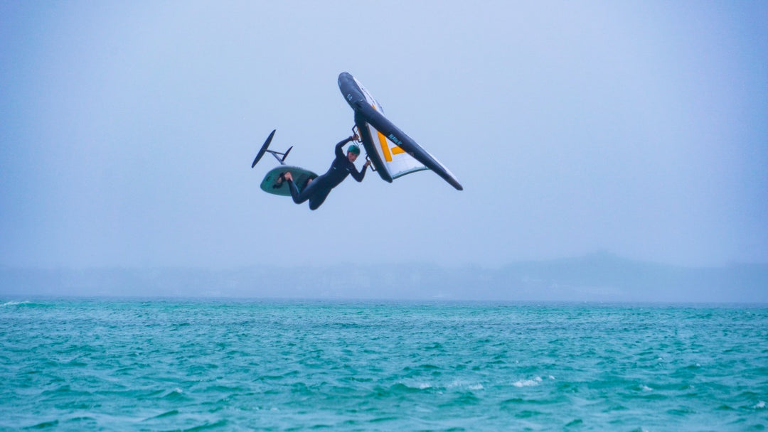 wingfoilers jumping with wingfoil wing