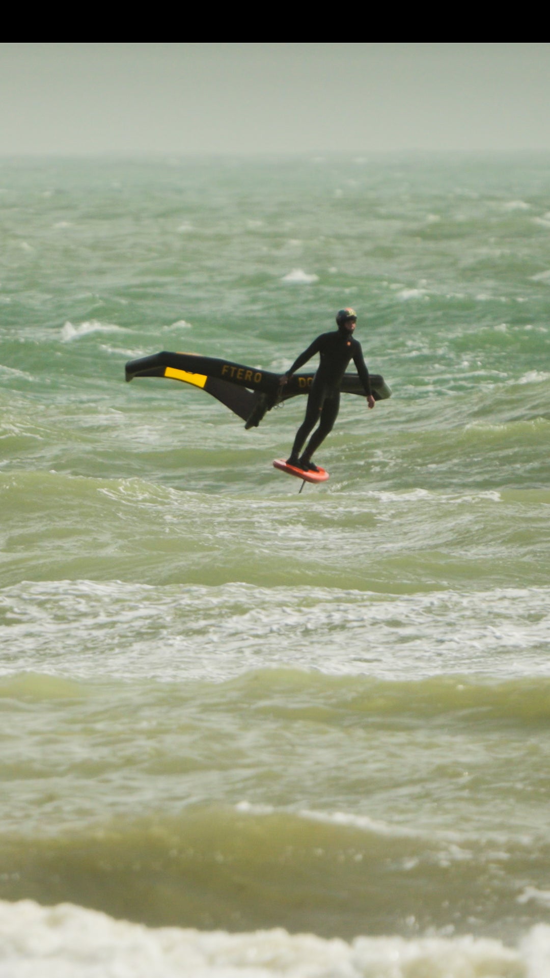 Mastering Wing Foiling in Waves: A Detailed Guide